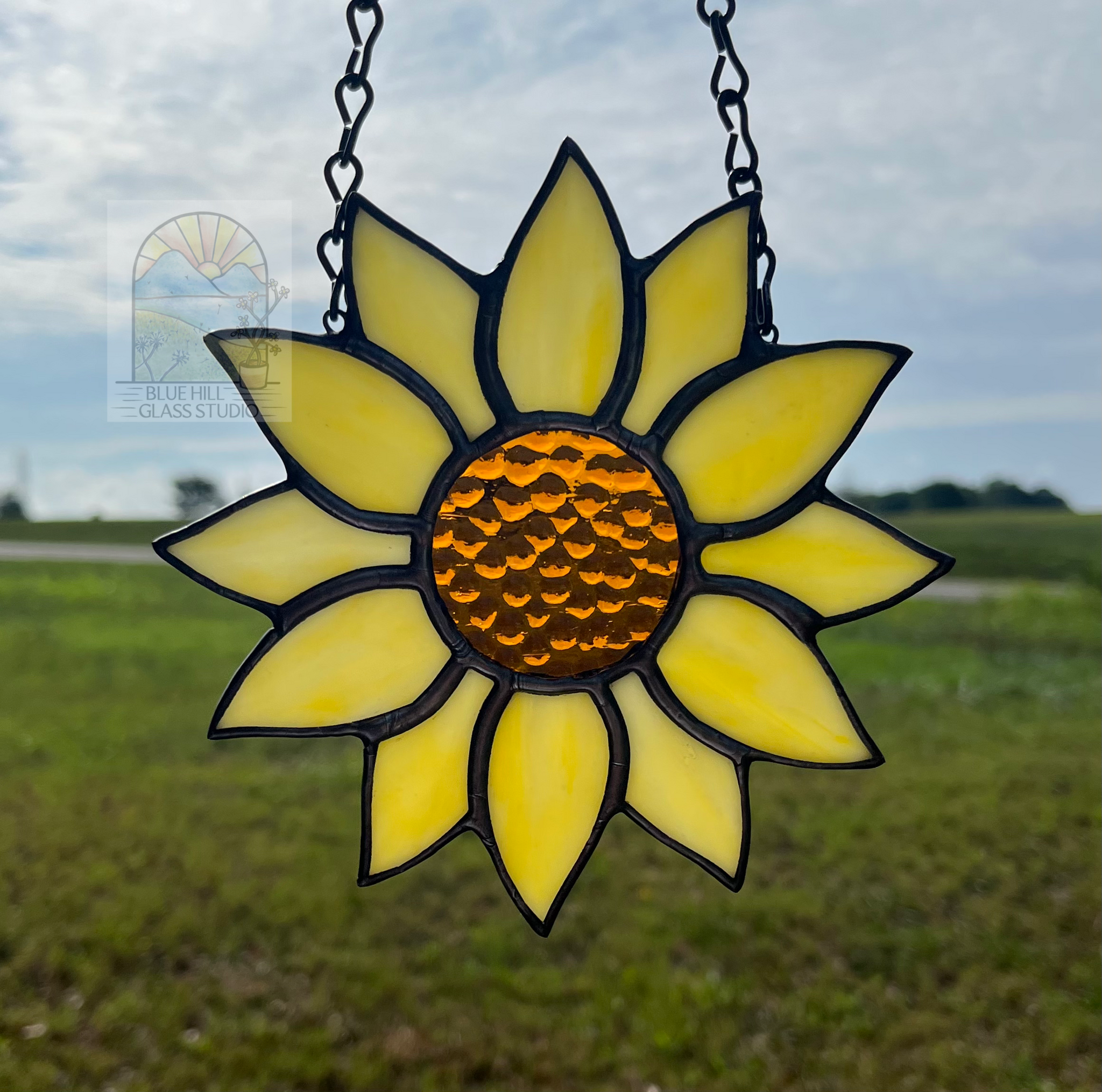 Sunflower stained glass suncatcher in yellow and amber glass